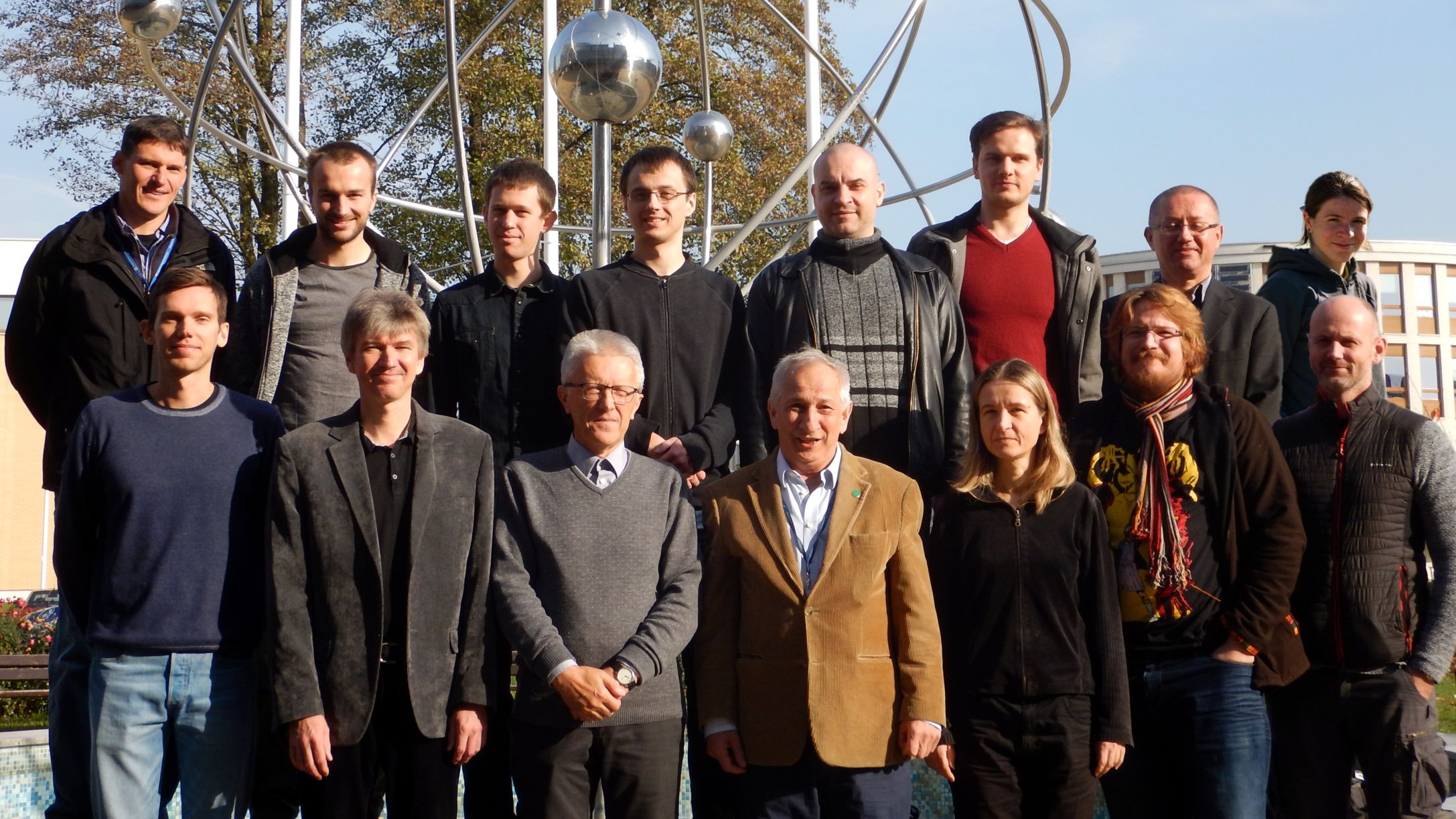 Team photo in front of the building Faculty of Physics, Astronomy and Applied Computer Science